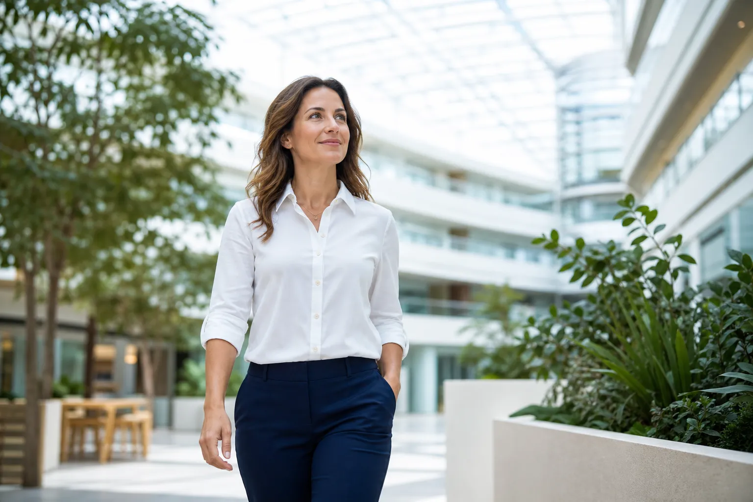 Woman in modern atrium wellness research lifestyle